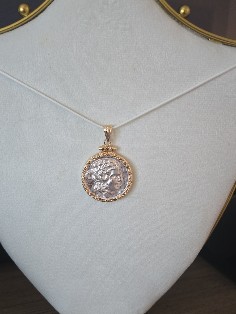 Custom Gold and Silver Medallion Pendant Necklace On Modern White Chain.